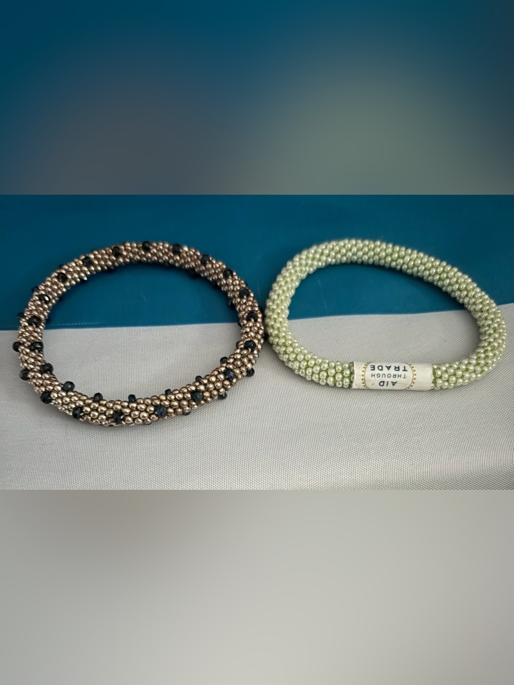 Aid Through Trade Roll On Beaded Bracelet Set — Mint Green and Bronze